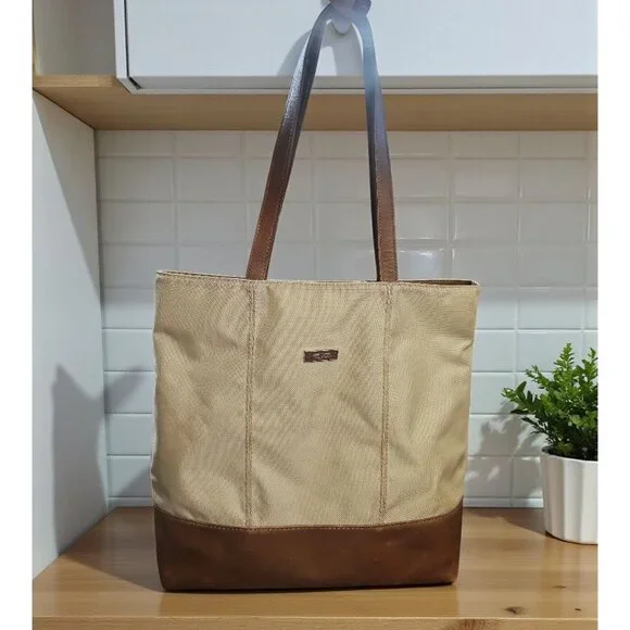 Tumi Beige Canvas & Brown Leather Tote Bag With Rear Zip Pocket And Handles - Picture 2 of 11